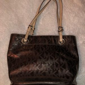 Michael Kors purse + matching wallet.